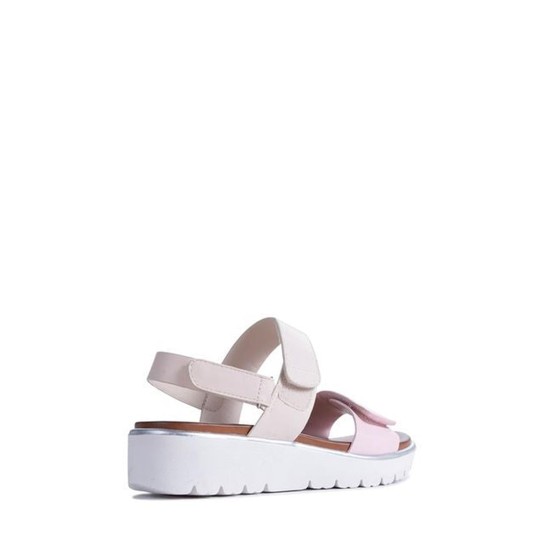 The Los Cabos Arica Pink Cream Summer Women's Sandal features a light pink and white design, thick white platform sole, open toe, ankle hook-and-loop closure, and back strap, shown from a rear side angle on a white background., 9321191338637, 932119133864