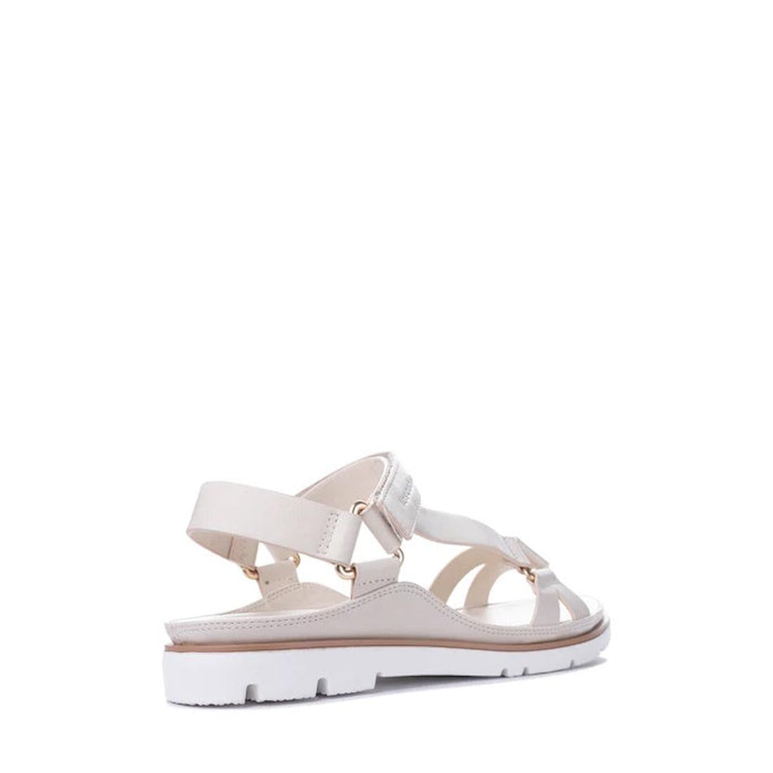 The Los Cabos Ashanti Bone Women's Sandal in soft bone color, with strappy vegan leather, cozy sole, and easy back strap closure.  ksnz