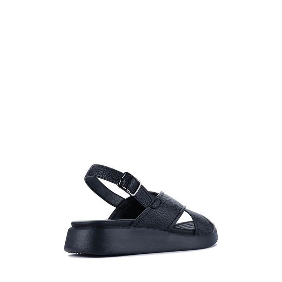 The Los Cabos Bogota Black Women's Summer Sandal Back Strap features a single black vegan leather sandal with thick sole, open toe, wide crisscross straps, an adjustable buckle heel strap, and a comfy footbed, shown on a plain white background., 932119129