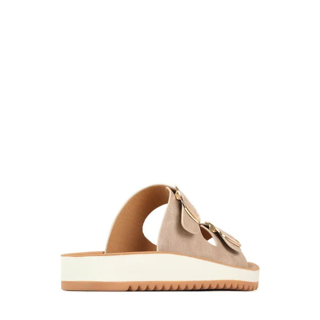 A side view of the Los Cabos Naara Taupe Adjustable Women's Summer Slide Sandal shows two buckle straps, a thick white sole with arch support, and a light brown treaded bottom in taupe vegan leather., 9321191159003, 9321191159010, 9321191160078, 932119115
