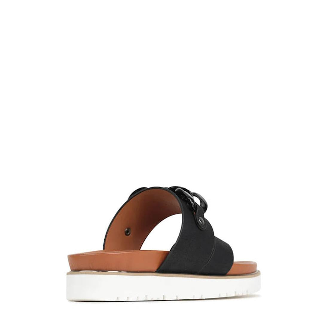 Los Cabos Cai Sandal with Chain Detail in black offers a comfy white sole, tan footbed, thick straps, and easy buckle closure.  ksnz