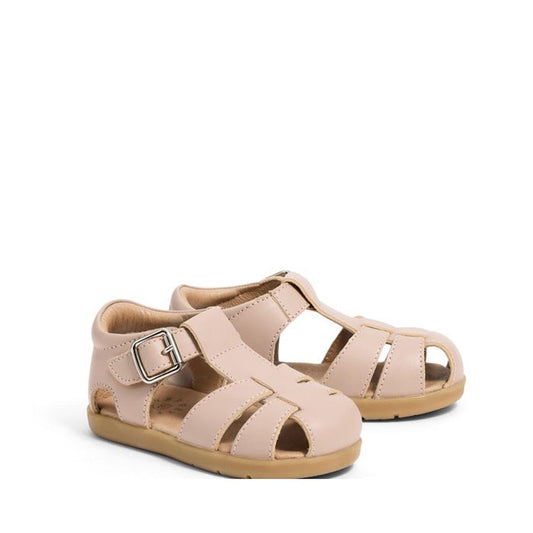 Pretty Brave 1st Walker Maddie Blush Close Toe Leather Sandal: light pink, podiatrist-approved toddler sandals with a cutout design, ankle straps, metal buckles, and tan rubber soles shown against a white background.