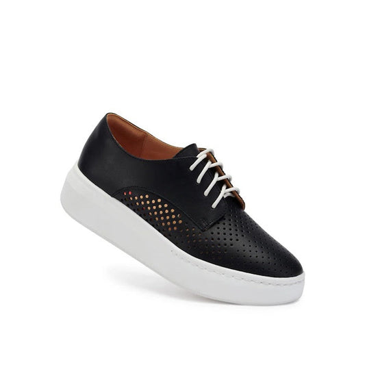 The Rollie Womens Derby City Punch Black Leather Trainer features a black leather upper, white laces, thick white platform sole, side perforations for breathability, and an orthotic-friendly removable footbed for stylish comfort.