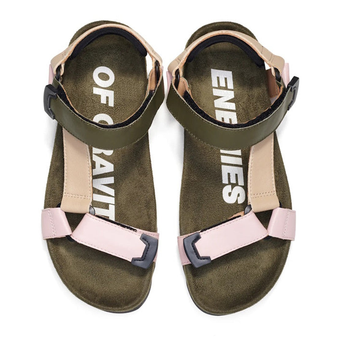 The Rollie Womens Sandal Tooth Wedge Blush Camo features olive green footbeds, pink and olive green sheep leather straps with black buckles, a sawtooth EVA wedge outsole, and insoles printed with "OF GRAVITY" and "ENEMIES., 9339554326726, 9339554326733, 9