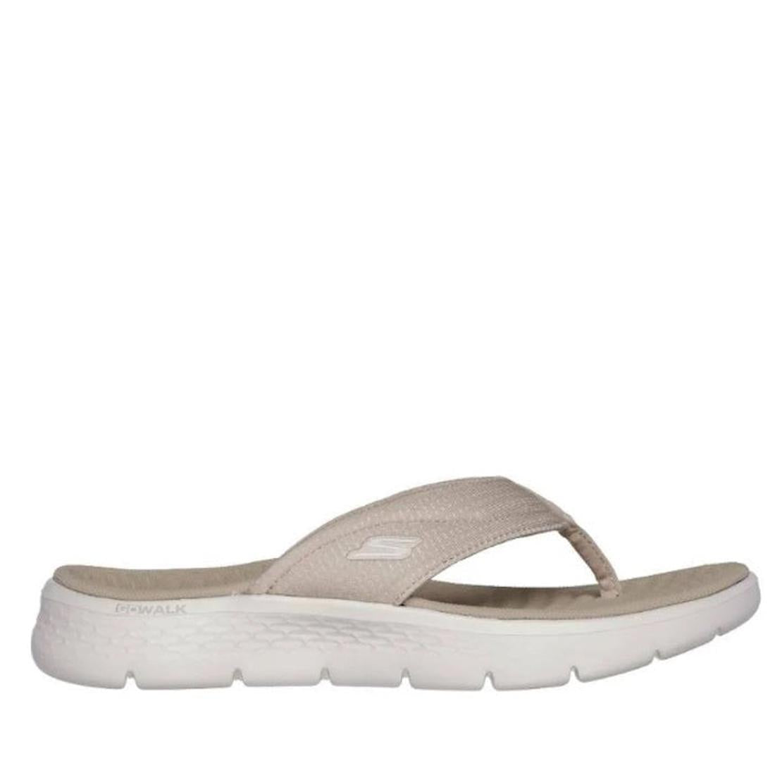 The Skechers Go Walk Flex Sandal Impress Slide in taupe features a fabric thong strap, plush memory foam footbed, and white textured sole. Shown from the side on a plain white background.