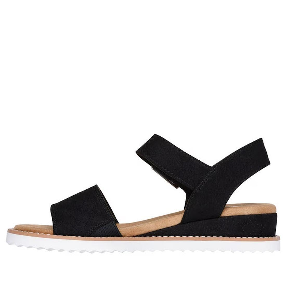 The Skechers Bobs Women's Desert Kiss Serendipitous Black WIDE Sandal is a vegan, open-toe wedge with a thick front and ankle strap, tan Memory Foam footbed, low wedge heel, white ridged sole, and minimalist design., 49003, 49004, 49005, 198739222050, 490