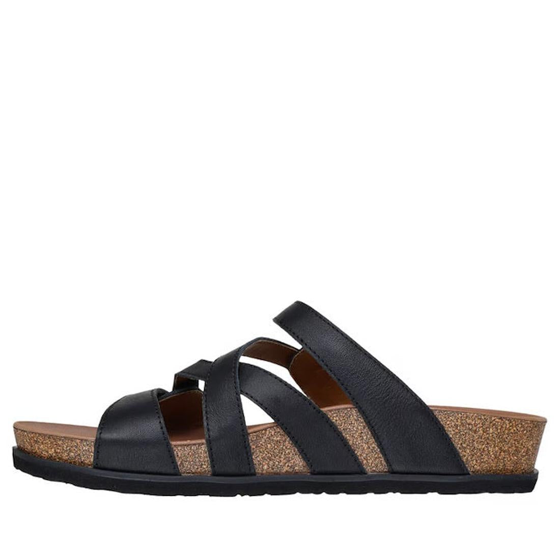 The Skechers Womens Arch Fit Granola Slim Black Slide features a leather upper, cork wedge sole, and black rubber outsole, displayed in side profile against a white background., 49036, 198739182132, 198739182149, 198739182156, 198739182163, 49041, 49042