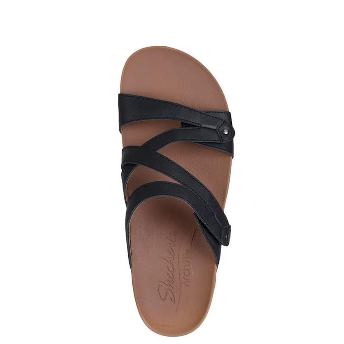 A single Skechers Womens Arch Fit Granola Slim Black Slide sandal with a leather upper and three crossing straps over a brown footbed, viewed from above. “Skechers Arch Fit” is embossed on the insole., 49036, 198739182132, 198739182149, 198739182156, 1987