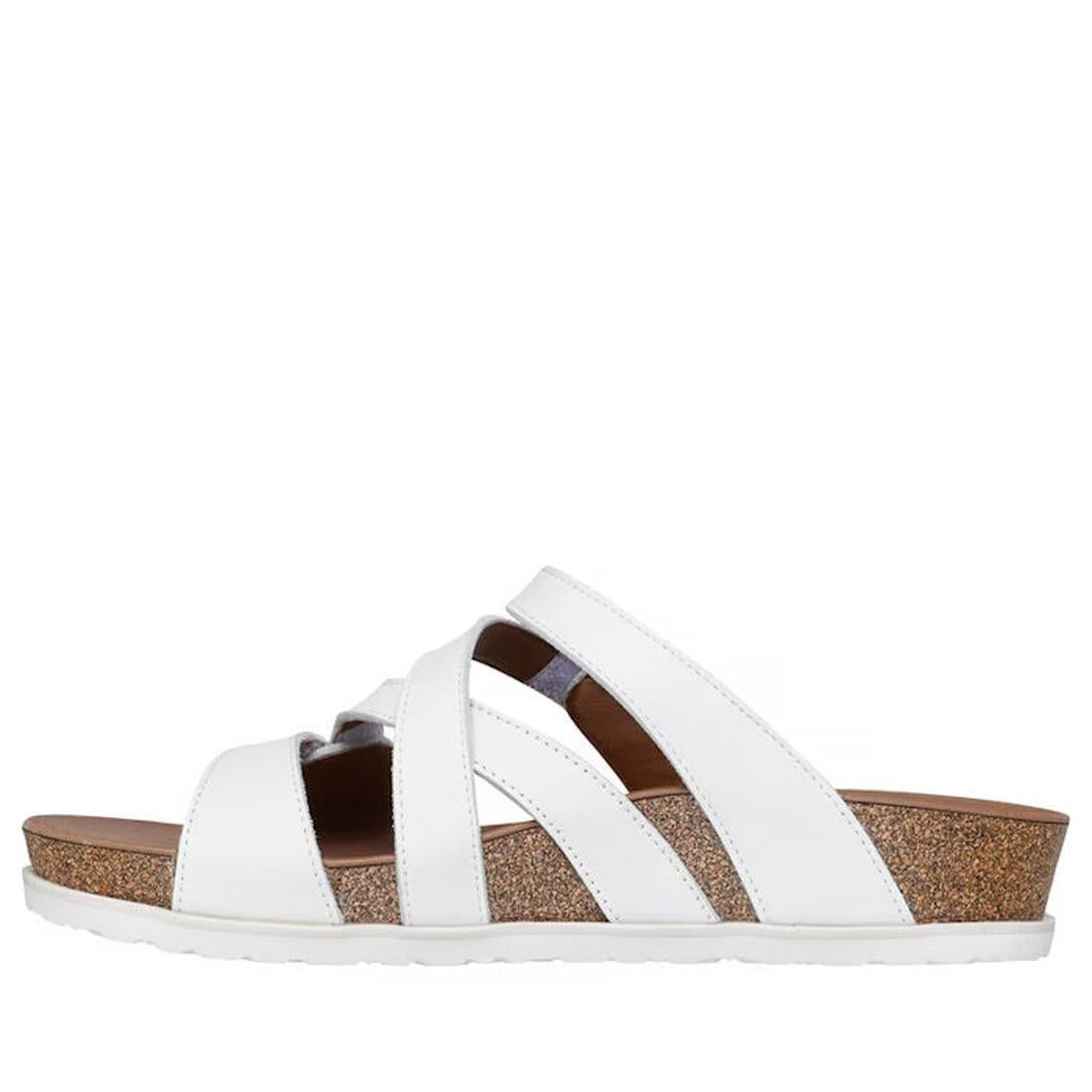 The Skechers Women's Arch Fit Granola Slim White Slide features multiple white leather crisscross straps, a supportive footbed, brown cork wedge sole, and a white rubber outsole, shown in profile against a plain background., 49043, 198739182224, 198739182