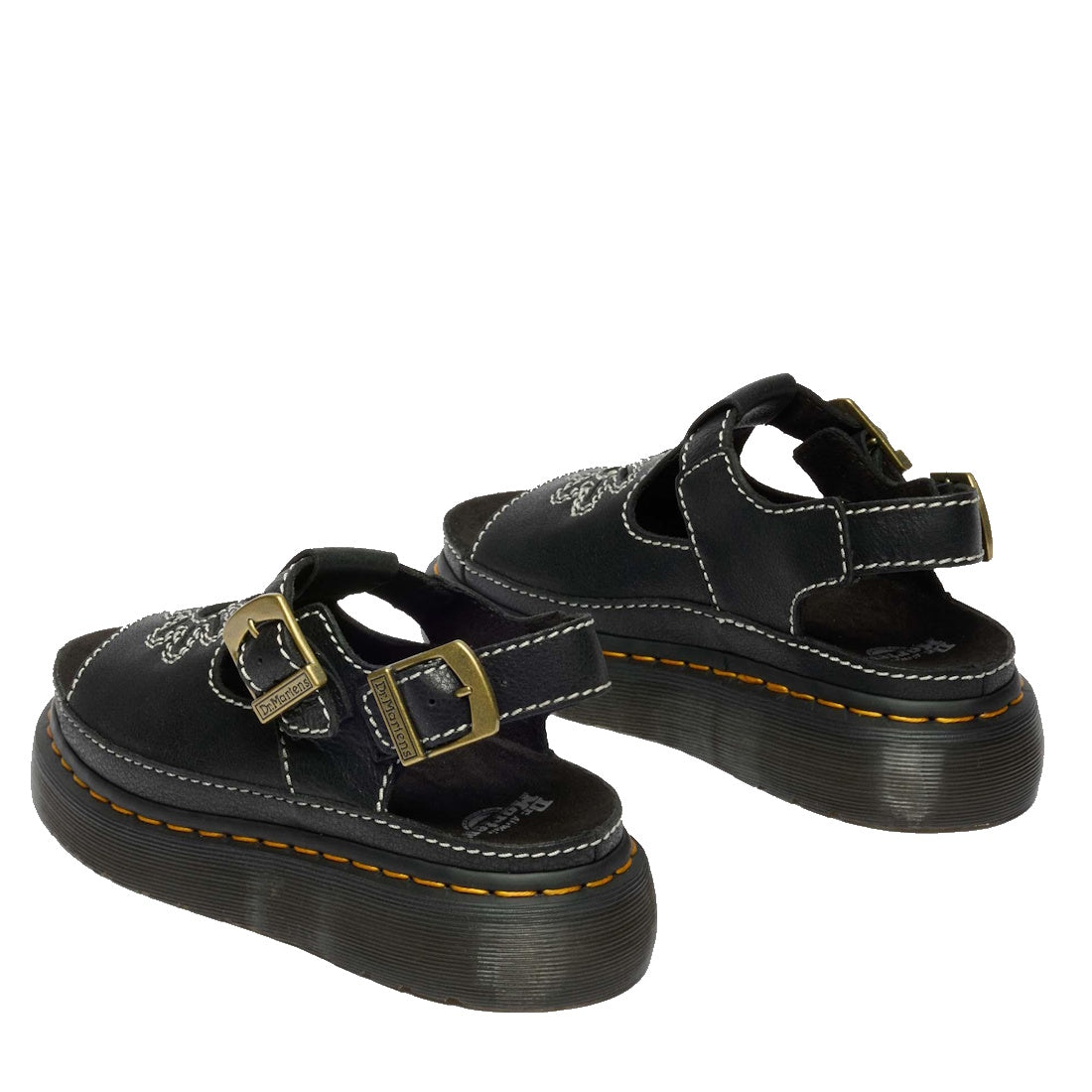The Dr Martens Dunnet Flower Sandal Black Quad Platform features a thick platform sole, two gold buckles, white stitching, and white embroidered designs on the top straps for a bold 90s-inspired look., 190665809190, 190665809206, 190665809213, 19066580923