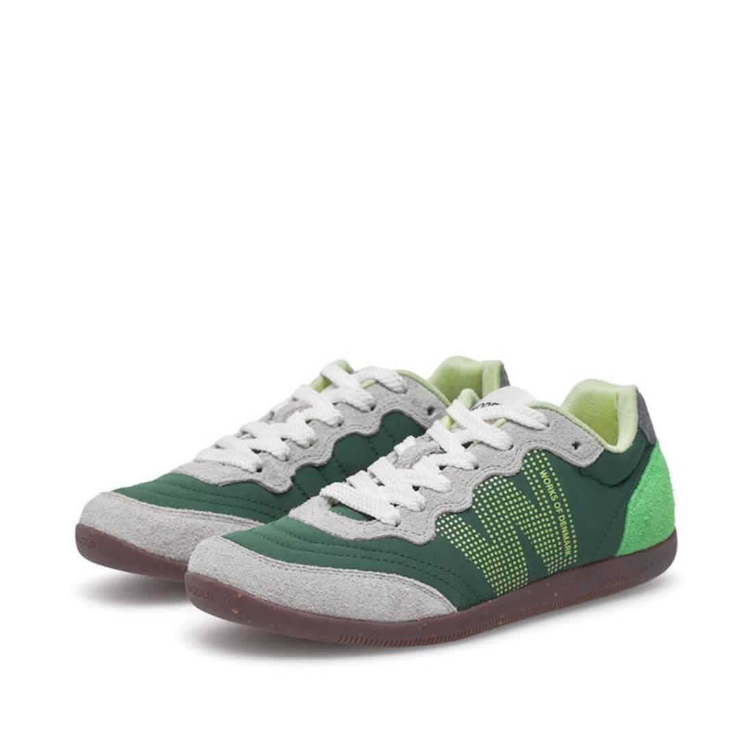 The Woden Nanna Apple Green Multi Lace Up Sneaker features green and gray mesh, gray suede accents, white laces, a patterned W detail, dark rubber soles, and a light green inner lining for a stylish, travel-friendly look., 50250, 5713326697834, 5713326697