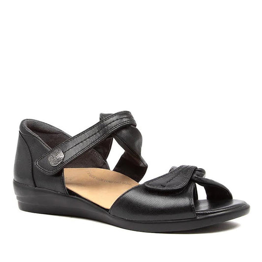 The Ziera Doxie W Wide Women's Black Leather Sandal has a low wedge heel, open toe, cut-out sides, adjustable Velcro straps for comfort and support, and a removable footbed for customizable high arch support.
