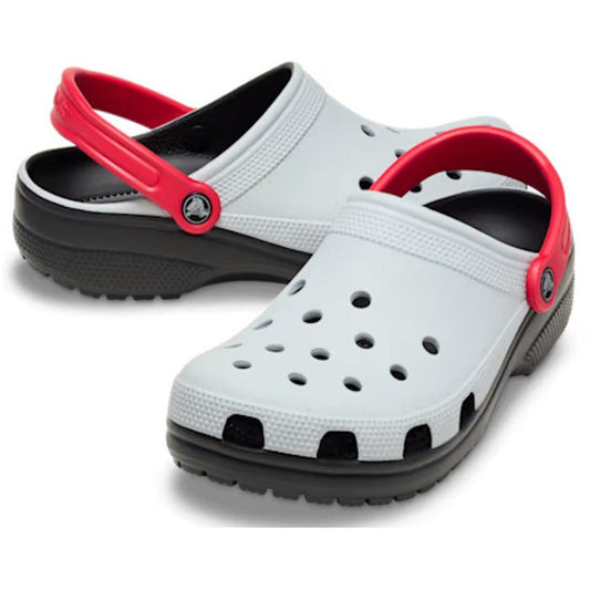 a pair of grey adults crocs clogs with red straps and black sole on a white background