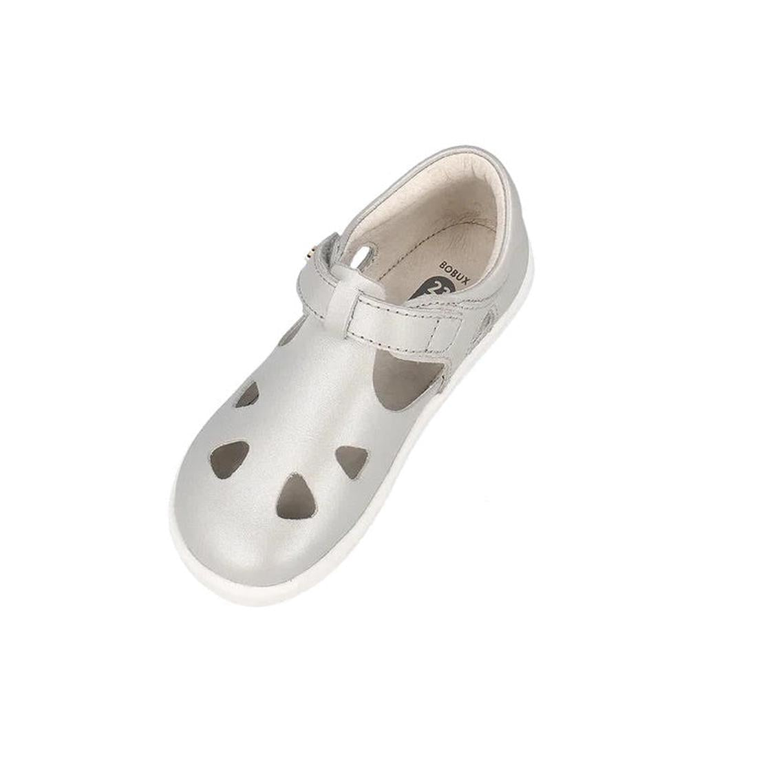 A single Bobux IWalk IW Zap II Sandal in metallic silver for children, featuring a closed-toe, Velcro strap, and heart-shaped cutouts on top, is displayed on a plain white background., 9420075777460, 9420075777675, 9420075781054, 9420075780002, 9420075778