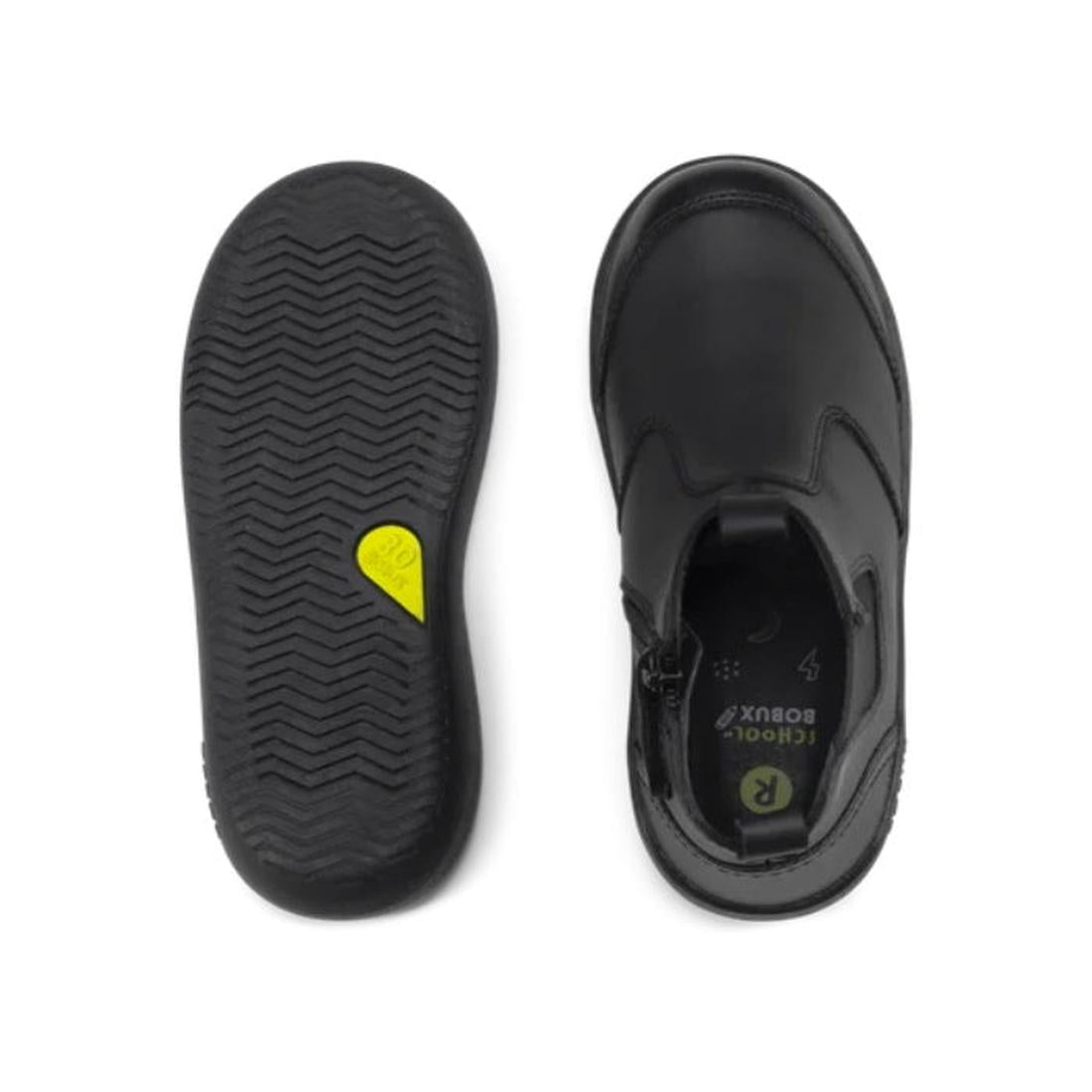A pair of Bobux Kid+ Black School Leather Boot Jodphur Black Sole Shoes viewed from above and below; the left shows a textured sole with a yellow accent, while the right displays the top and inner side with an R label inside., 27690, 9420071306183, 942007