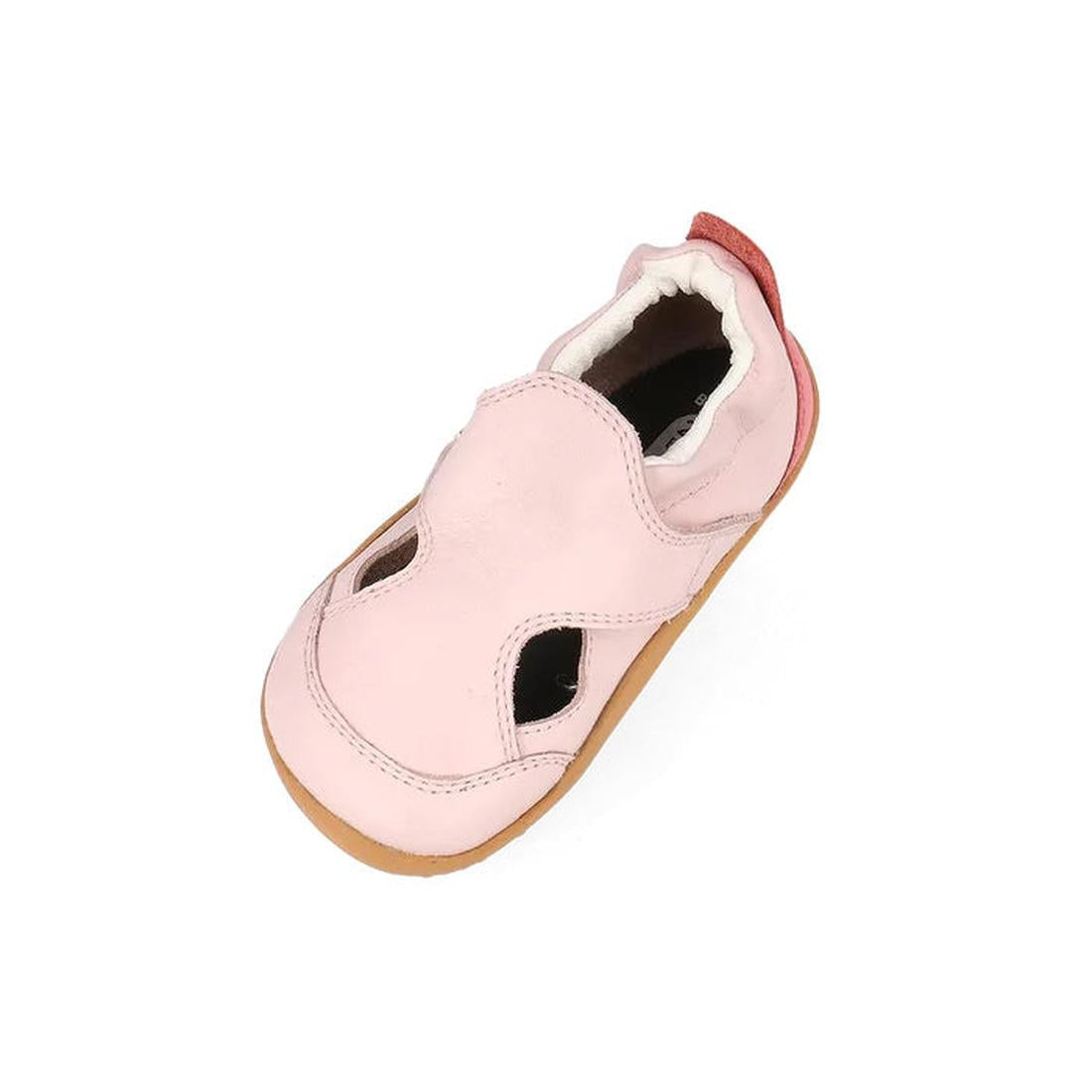 The Bobux XP Explorer Breeze First Walker Sandal in Rose Water Pink (502405) is a single baby shoe for first walkers, with cut-out details, a flexible sole, and red heel accent, shown on a white background., 9420075784864, 9420075786004, 9420075783645, 94