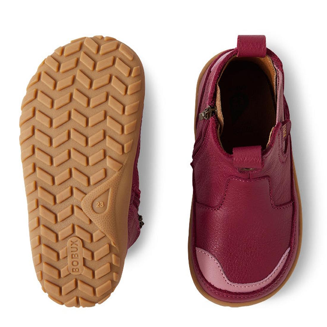 A pair of Bobux IW Iwalk Trail Leather Boot Beaujolias Purple Alpha kids' boots—one shows the textured tan rubber sole with size "23," the other highlights the upper, side zipper, and a barefoot-shaped toe box for comfort., 9420068563667, 9420068563674, 9