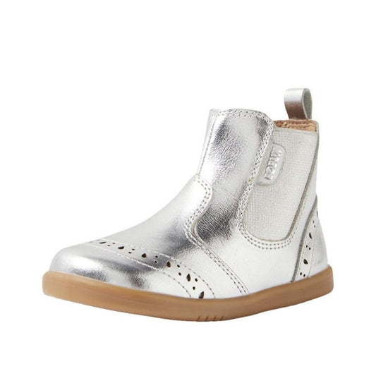 The Bobux IW Iwalk Billie Jodhpur Girls Leather Boot in Silver features elastic side panels, decorative perforations, a heel pull tab, and a flexible sole—stylish and comfortable leather boots for toddlers.