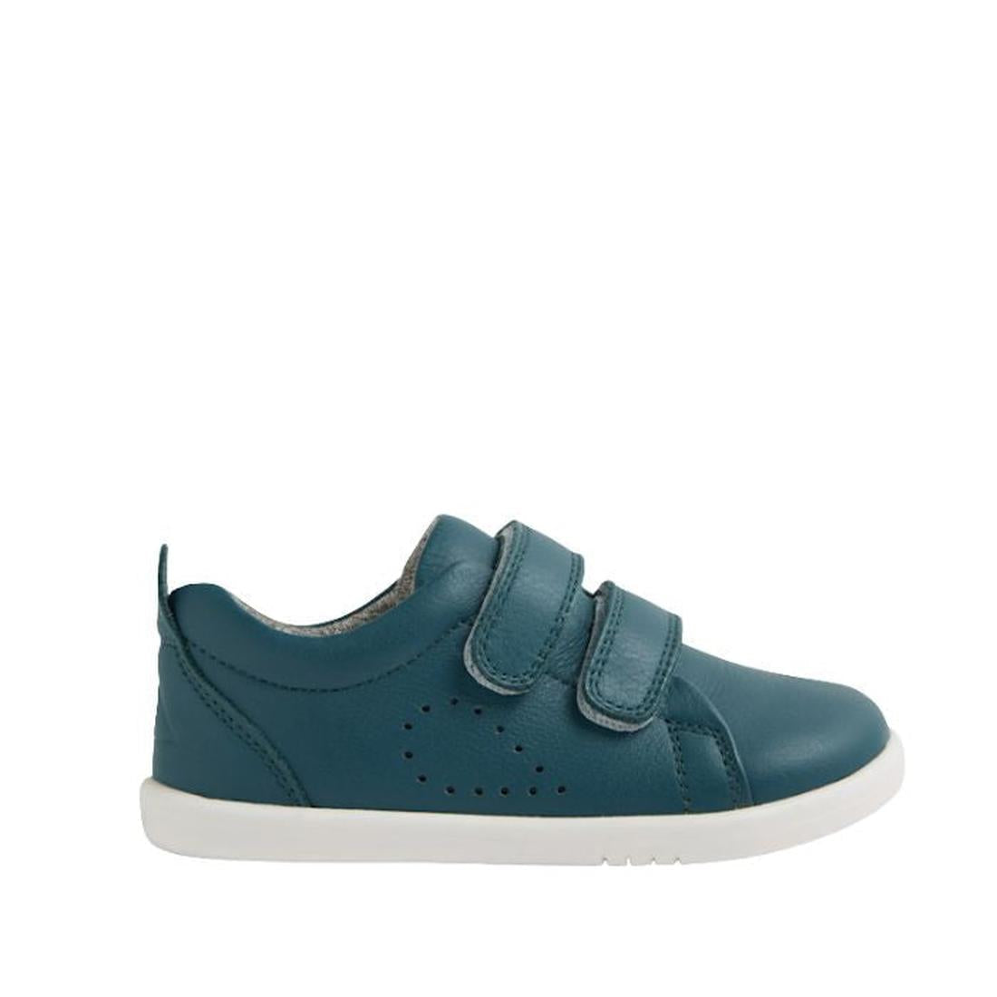 The Bobux IW Iwalk Grass Court Leather Sneaker in Mediterranean Green features a premium leather upper, two Velcro straps, perforated side holes, and a white sole—ideal toddler shoes for everyday wear. Shown in side profile on a white background., 9420074