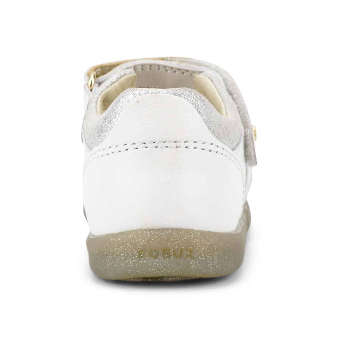 A close-up rear view of the Bobux iwalk IW Magic Girls Leather Sparkle Sandal in white, featuring a glittery sole, Velcro strap, and detailed stitching, photographed against a white background., 9420068523081, 9420068523098, 9420068523104, 9420068523111, 