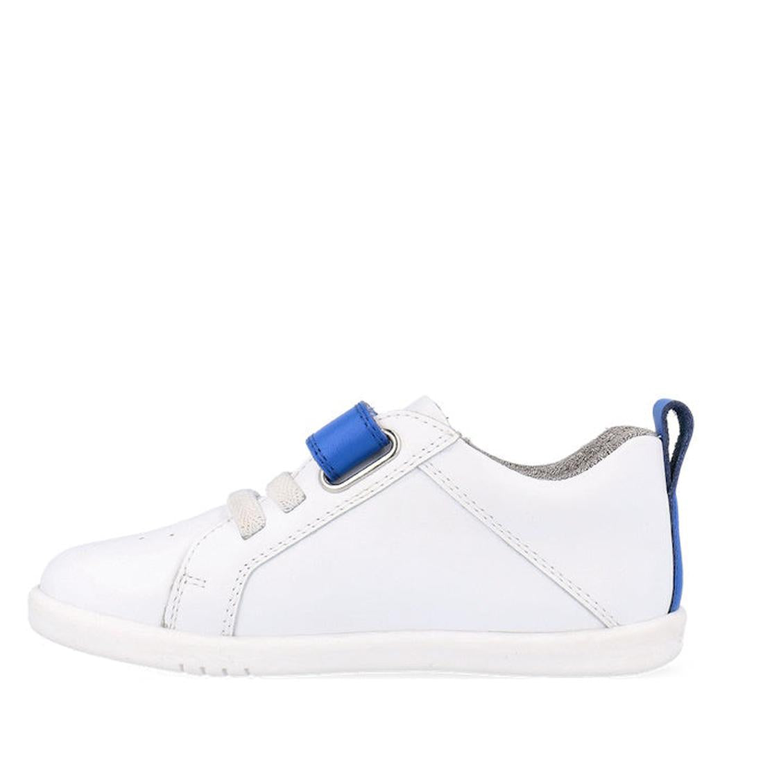 The Bobux Kids IWalk IW Pace Sneaker White Blue 650401 features white laces, a blue Velcro strap, and a blue pull tab—shown side view on white background. Perfect unisex Velcro shoes for everyday wear., 9420075780583, 9420075779693, 9420075774582, 9420075