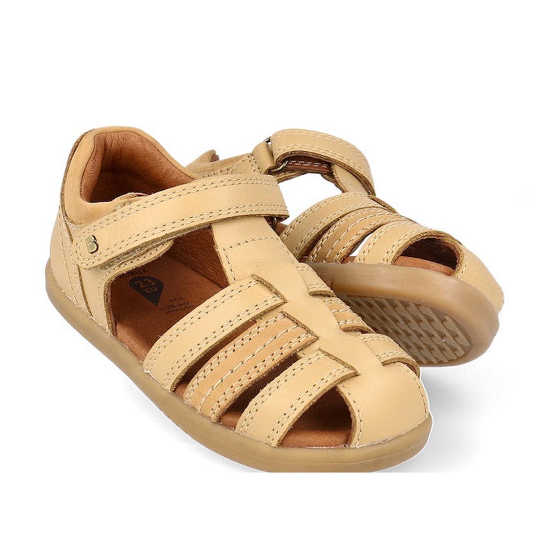 a pair of Bobux IWalk Roam Sandal Parchment Beige Closed Toe 626030- closed toe sandals with closed back for heel support. velcro around the heel and straps of leather over the toes so air can move freely around the toes.