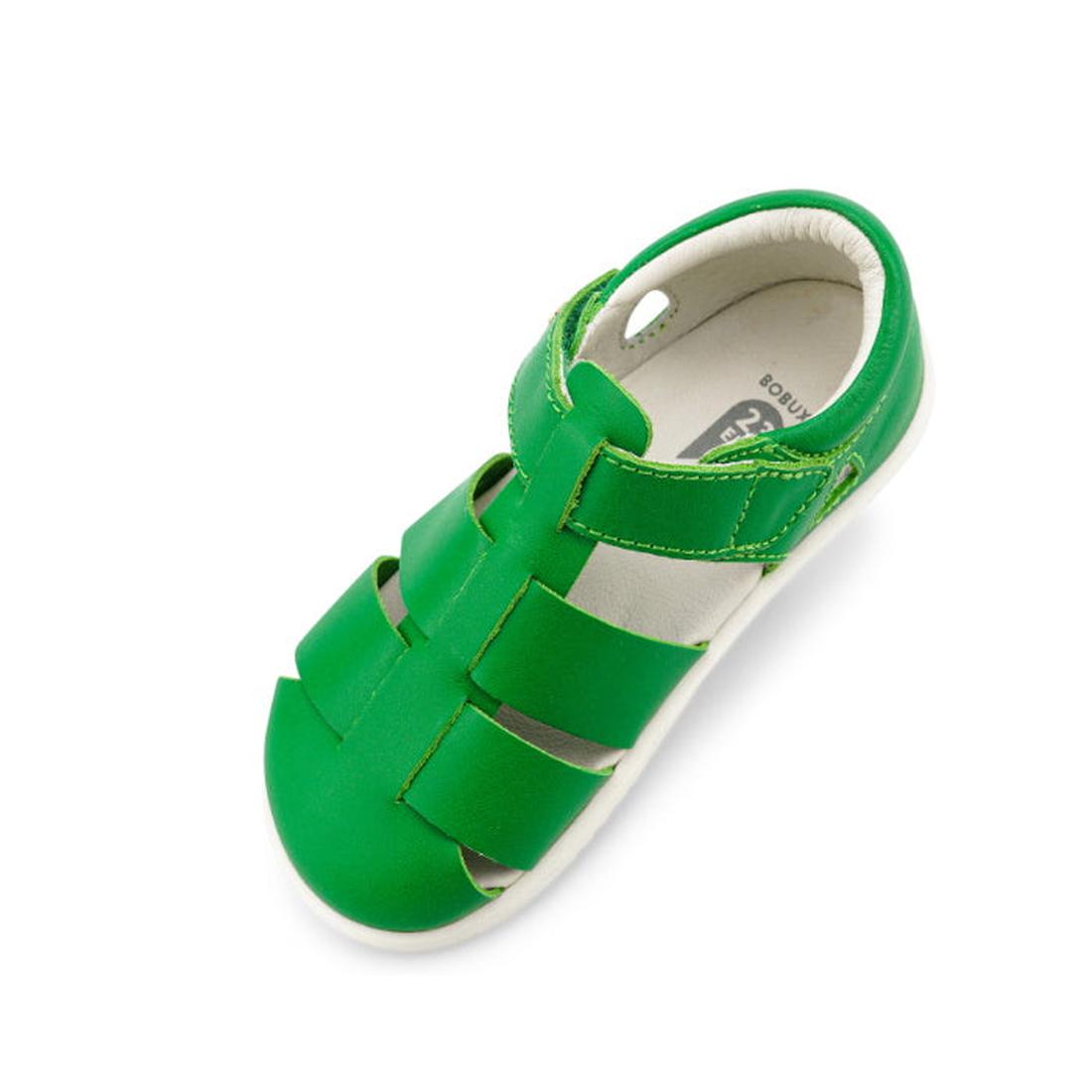 The Bobux Iwalk IW Quick Dry Tidal Sandal 634402 in Emerald Green for children features quick-dry leather, open sides, and a hook-and-loop strap, shown from an angled top view on a white background., 9420057386994, 9420057387021, 9420057387052, 9420057387