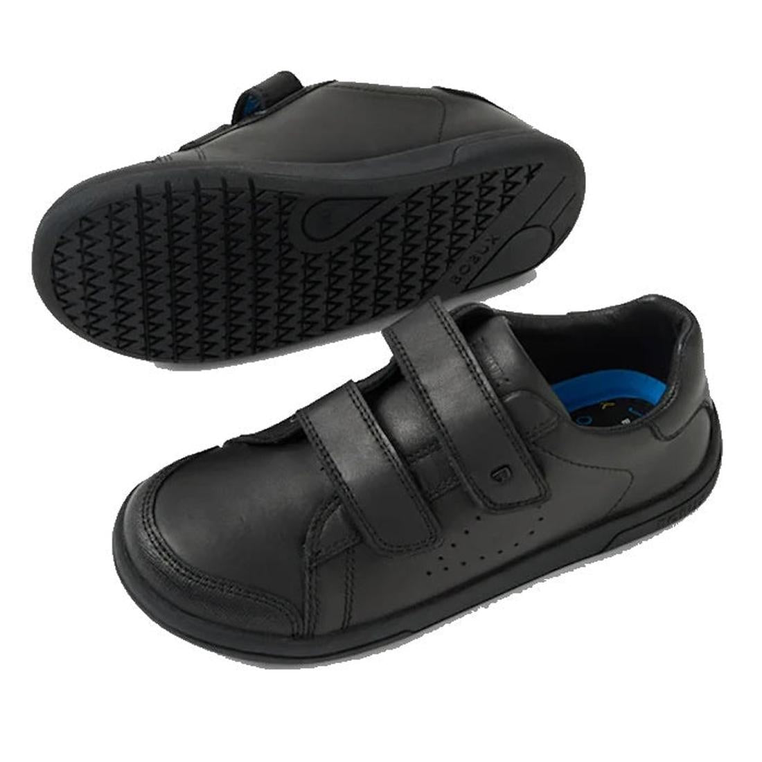 The Bobux Kid+ Jacks Black School Leather Shoe Sneaker for kids features two adjustable straps and textured rubber soles, displayed from the side and underside on a white background., 9420074842299, 9420074842305, 9420074842312, 9420074842329, 94200748423