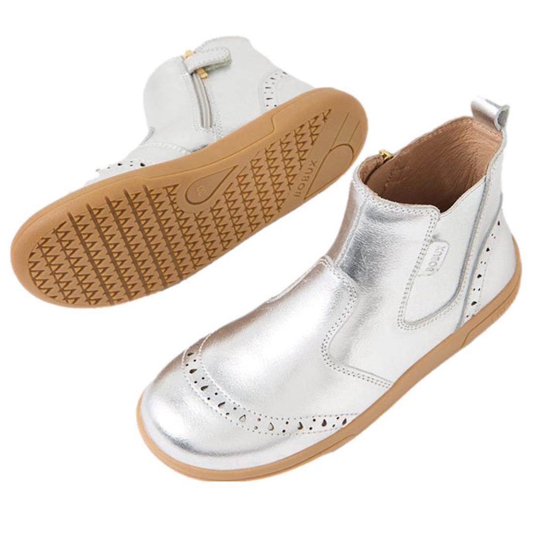 Bobux Kid+ KP Billie 2 II Girls Leather Boot Silver: shiny silver leather kids' boots with tan rubber soles, side zippers, decorative perforations, and a heel pull tab; one boot is upright while the other shows the flexible sole., 9420074867032, 942007486