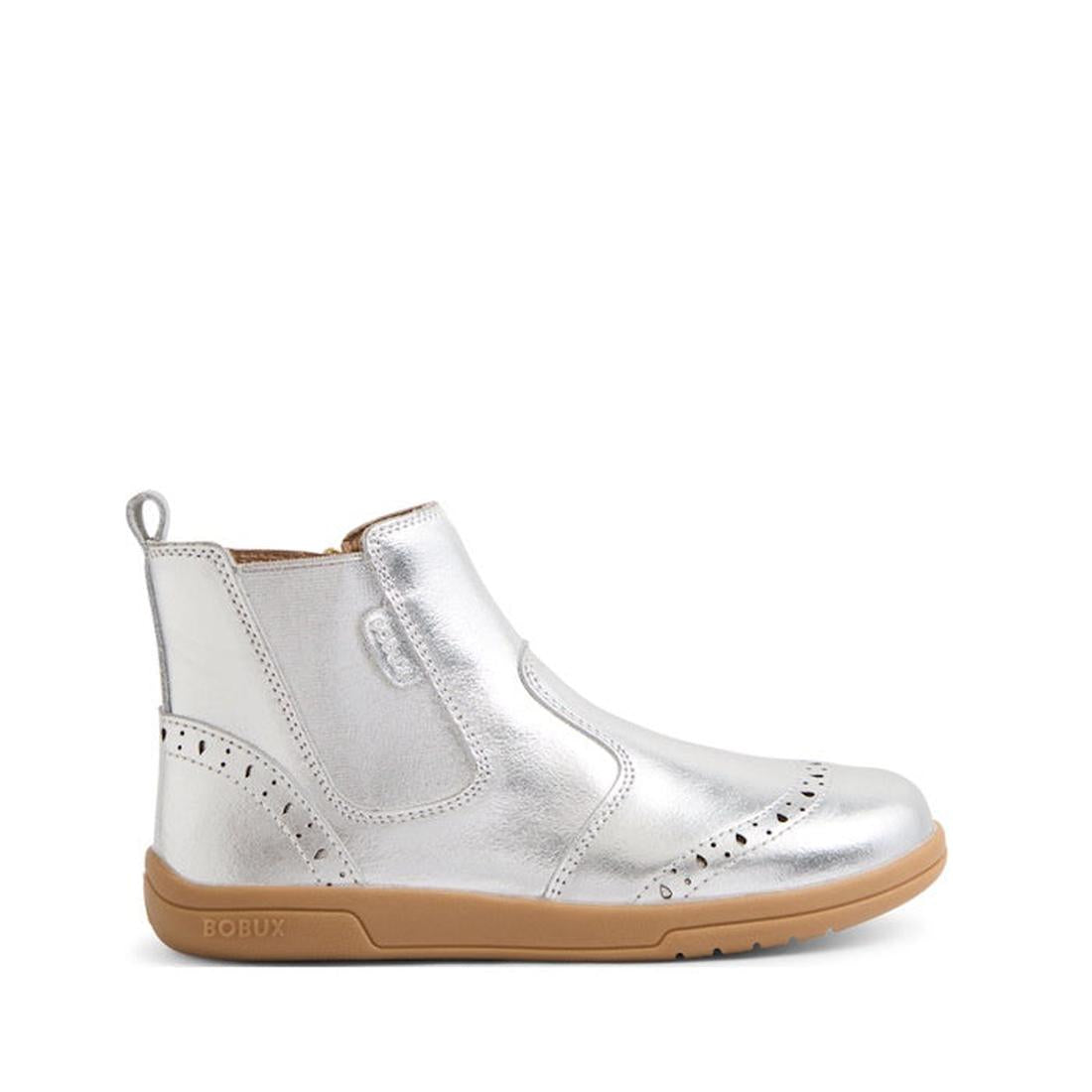 The Bobux Kid+ KP Billie 2 II Girls Leather Boot Silver features decorative perforations, an elastic side panel, and a light brown flexible sole for comfort., 9420074867032, 9420074867049, 9420074867056, 9420074867063, 9420074867070