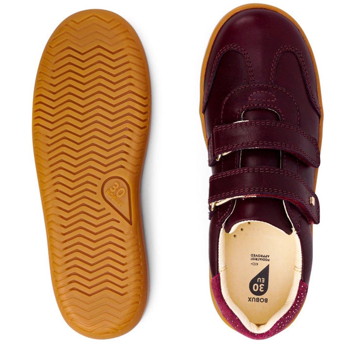 The Bobux Kids Plus KP Sprite Sneaker in Boysenberry features a maroon leather upper, brown rubber soles with zigzag tread, double hook-and-loop straps, and reinforced toe and heel—shown from both top and bottom views., 29968, 9420071316663, 9420071316670
