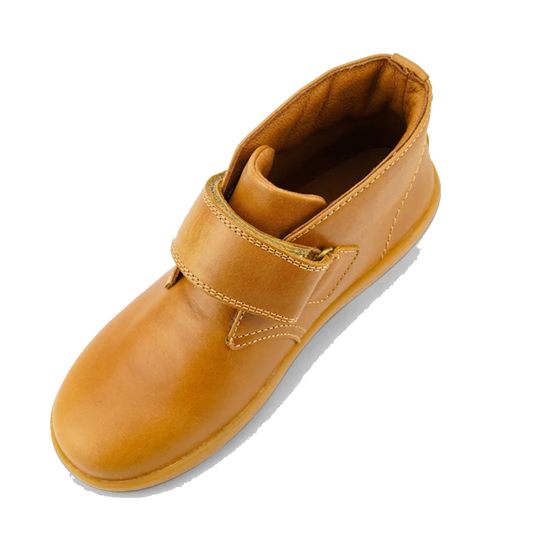 The Bobux Kid+ Desert Boot Caramel 830305Z top down view is a brown leather unisex children’s high-top boot with a tan rubber sole and wide hook-and-loop strap, shown in side profile against a white background., 9420068516861, 9420075719682, 9420075719699