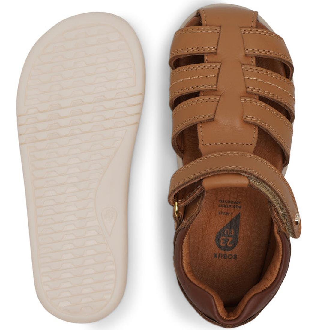 A pair of Bobux IWalk Roam Sandal Caramel Toffee leather kids sandals shown from top and bottom views, featuring a closed toe, rubber sole, and an easy Velcro strap across the top., 9420071319169, 9420071319176, 9420071319183, 9420071319190, 9420071319206