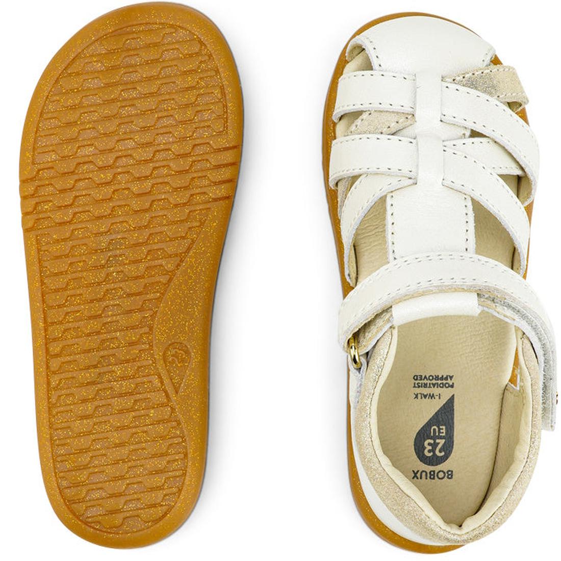 The Bobux iwalk Cross Jump Sandal Moon Pearl 636708 is a children’s closed toe sandal in white and beige with a Velcro strap, shown from top and bottom. It features a brown textured sole and comes in size 23 EU., 9420068516335, 9420068516342, 942006851635