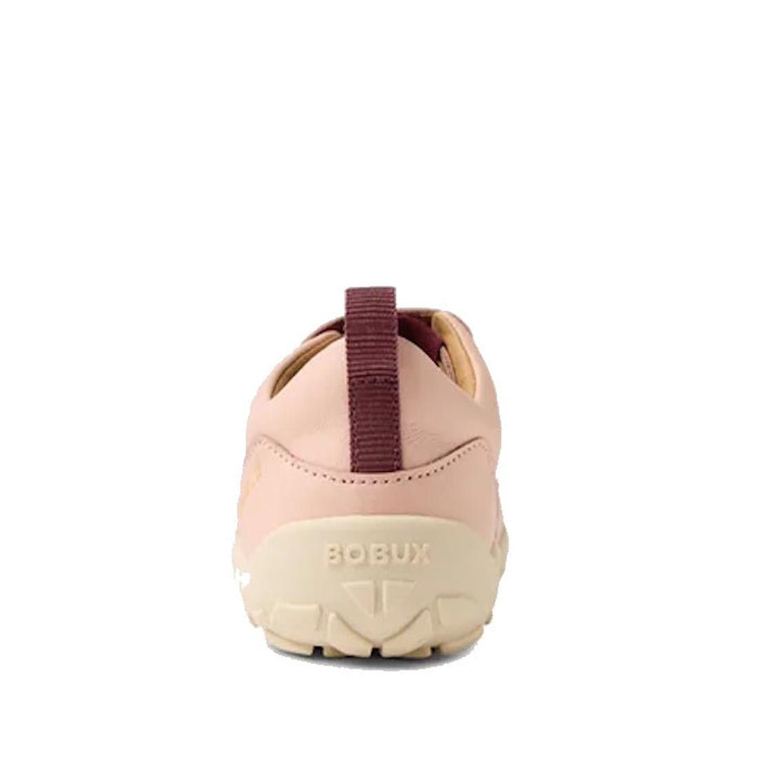 The Bobux Kid+ Dawn Leather Sneaker Cameo Rose Pink Alpha features a pink and beige leather design, BOBUX embossed on the heel, a maroon pull tab, and a barefoot-shaped toe-box for natural comfort., 9420068565647, 9420068565654, 9420068565661, 94200685656