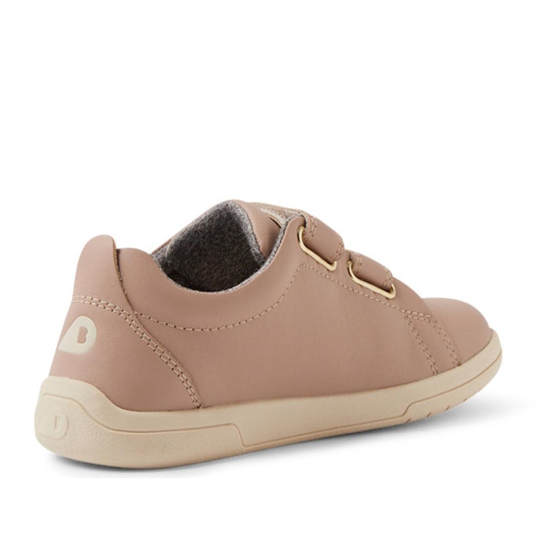 The Bobux KP Kids Plus Grass Court 2 II Leather Sneaker in Warm Taupe features double adjustable velcro straps, gold eyelets, a cream rubber sole, and soft inner lining, shown from the outer side and heel., 9420074831460, 9420074831477, 9420074831484, 942