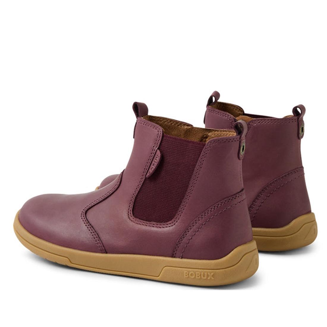 A pair of Bobux KP Kids Plus Jodhpur 2 II Juniors leather boots in fig purple, featuring elastic side panels, pull tabs, and a flexible tan rubber sole with the BOBUX brand name on the side., 9420074834980, 9420074834997, 9420074835000, 9420074835017, 942