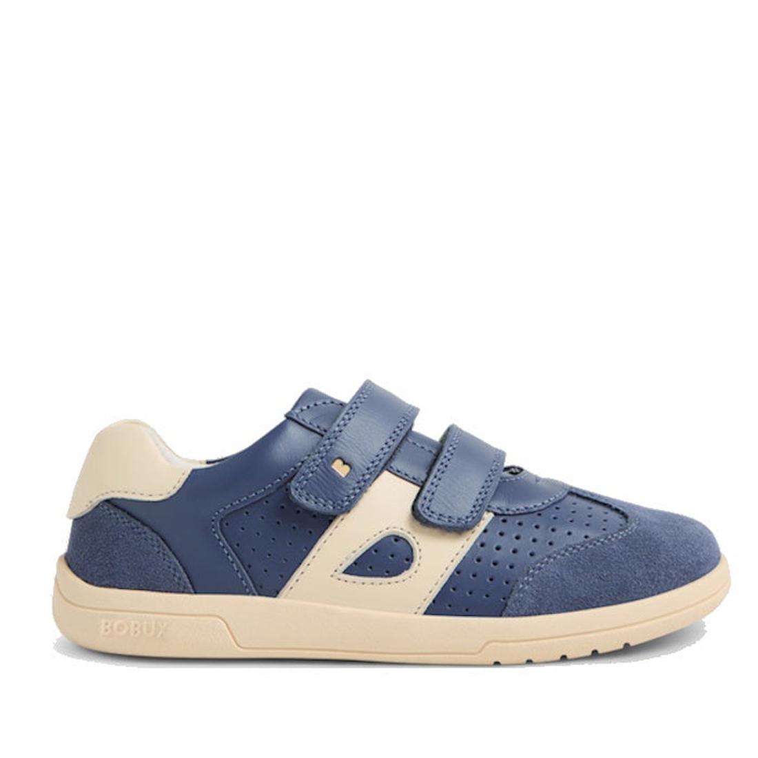 The Bobux KP Kids Plus Titan Juniors Leather Sneaker in Vintage Indigo Blue is a children's shoe with two velcro straps, perforated details, a cream sole, leather and suede textures, and BOBUX branding on the sole., 9420074855824, 9420074855831, 942007485