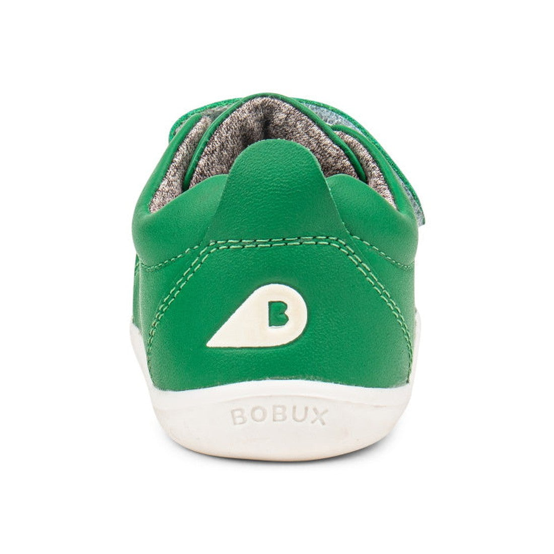 The Bobux Step Up SU Grass Court Trainer 728911 in Emerald Green is a toddler shoe with a white sole, white BOBUX logo and triangle with a B on the back, plus soft gray lining—perfect as a stylish first-walker trainer., 9420057331475, 9420057331482, 94200