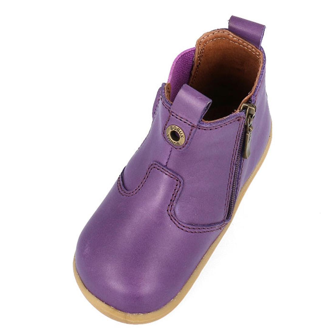 The Bobux Step Up Jodphur Boot Indigo Purple is a single unisex first walker boot in purple with an indigo hue, tan sole, brown lining, side zipper, and a snap button on the front pull tab., 9420075788879, 9420075789456, 9420075788916, 35573