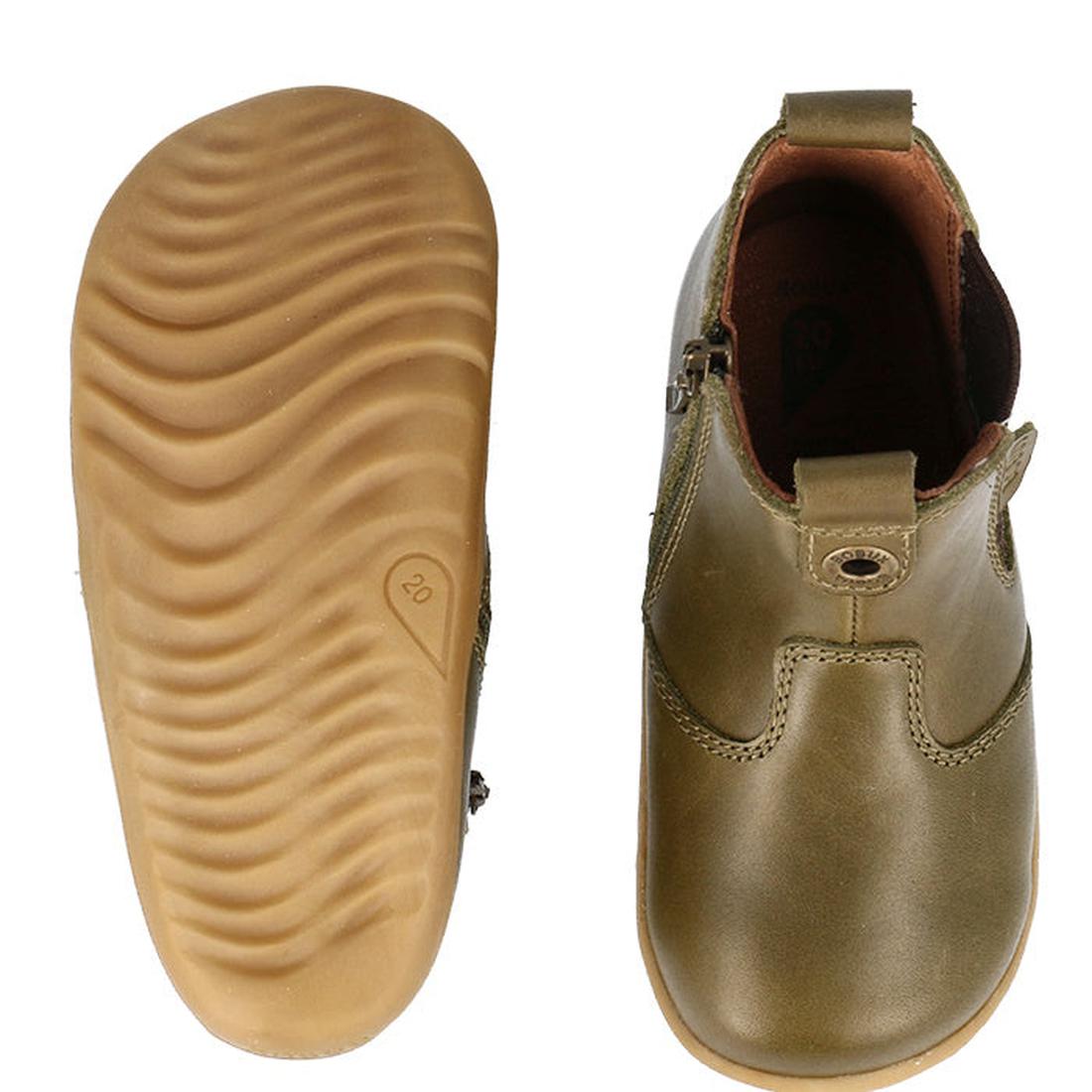 The Bobux Step Up Jodphur Boot Olive 721960 is a pair of unisex toddler boots in olive green with tan rubber soles, featuring a wavy tread, rounded toe, and side zipper—ideal for first walkers., 9420075796300, 9420075796126, 9420075796430, 9420075796553