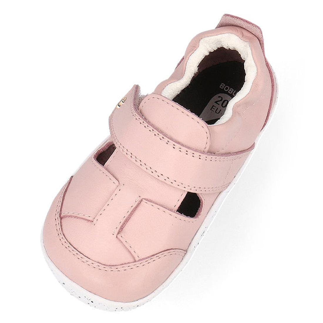 The Bobux XP Explorer Beau First Walker Sandal Blossom Pink 502305 is a single pink closed-toe shoe with a soft white lining, adjustable Velcro strap, small cutout details, and a flexible white sole., 9420075785915, 9420075784284, 9420075783980, 942007578