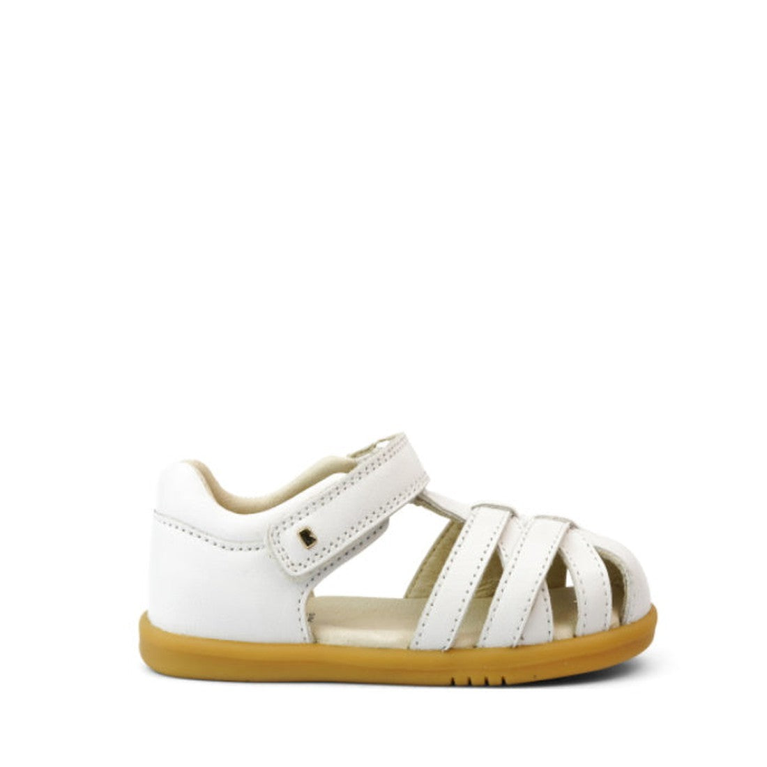 The Bobux iwalk Cross Jump Sandal White Closed Toe 636706 is a white leather toddler sandal with a closed heel, open toe, multiple straps, secure Velcro fastening, and a light brown rubber sole for comfort and support., 9420062083949, 9420062083956, 94200