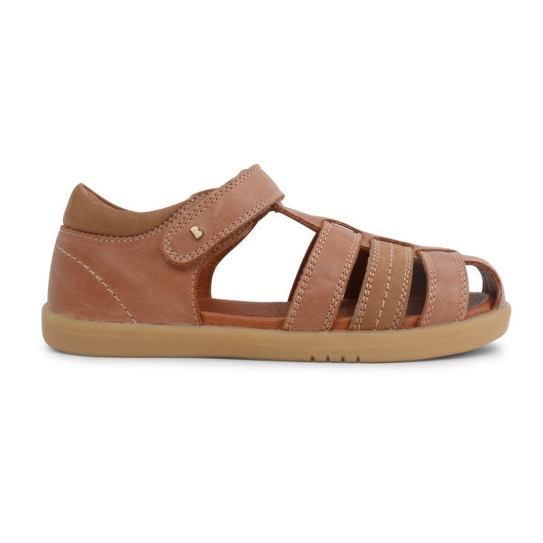The Bobux Kid+ Plus Roam Caramel Closed Toe Sandal (830506A) for boys features a brown leather design with a closed heel, open toe, multiple straps, hook-and-loop closure, and light brown rubber sole, shown side-on against a white background., 94200620499