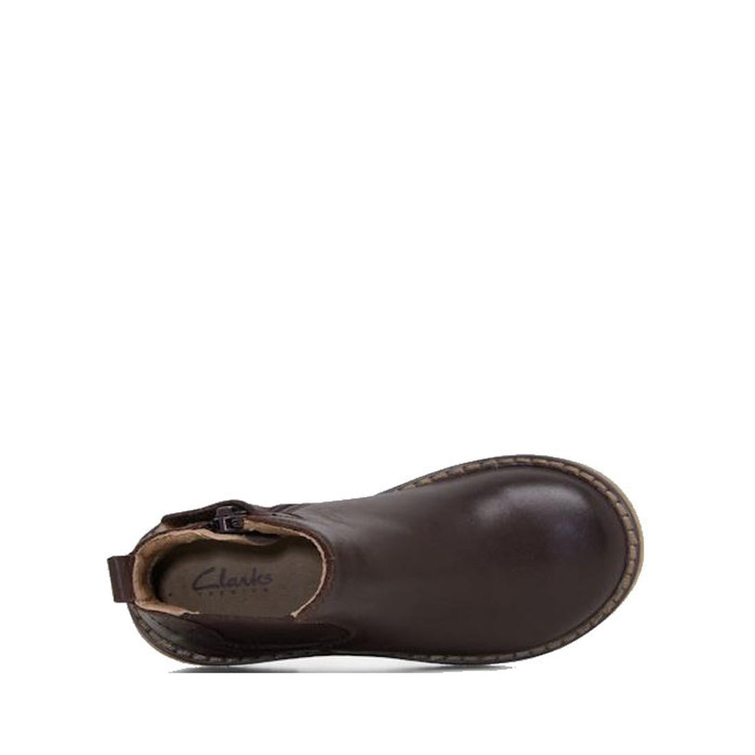 Top view of the Clarks Chelsea II Jnr Toddlers Leather Boot in dark brown genuine leather, featuring a rounded toe, visible stitching around the sole, and the Clarks brand printed on the insole near the heel., 9336078965349, 9336078965356, 9336078965363, 