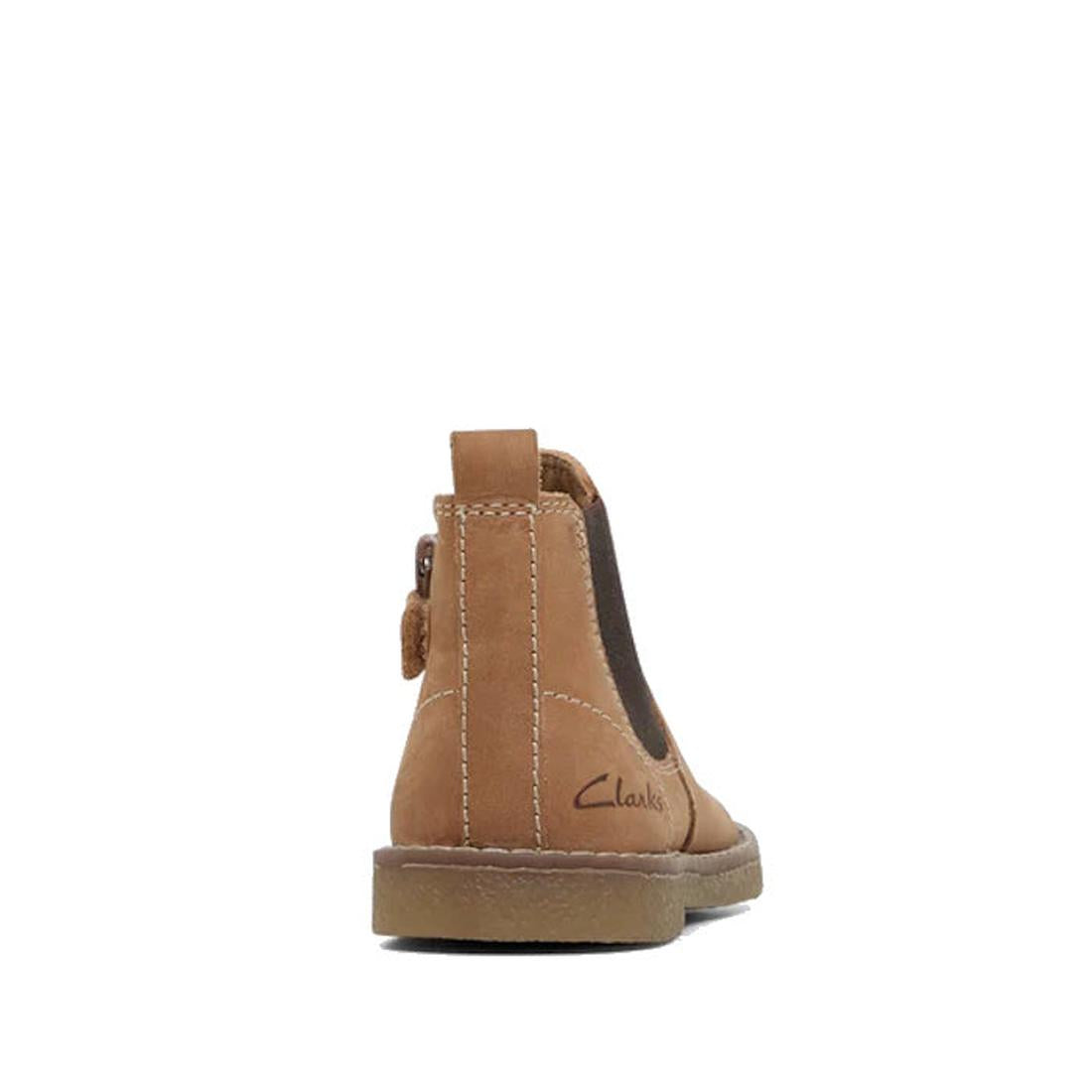 The Clarks Chelsea II Jnr Tan Toddlers Leather Boot features tan leather, a flat rubber sole, visible stitching, pull tab, elastic side panel, and Clarks logo at the heel. Shown from the rear on a white background. Puddle Proof design for everyday wear., 