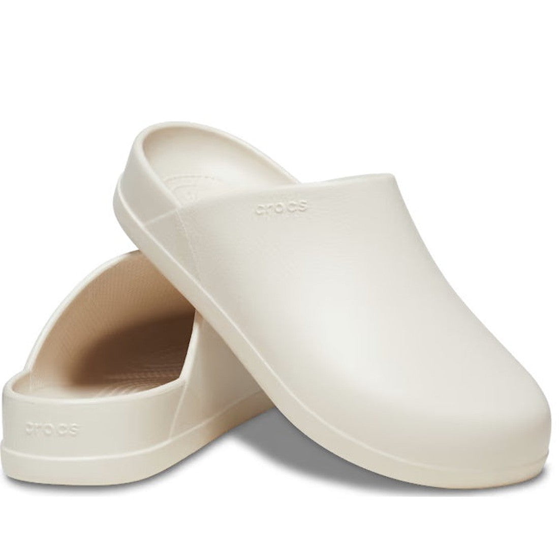 Crocs Dylan Clog Mules in stucco off white, cozy slip-ons with cushioned soles, closed toe and open back—perfect for all ages.  ksnz
