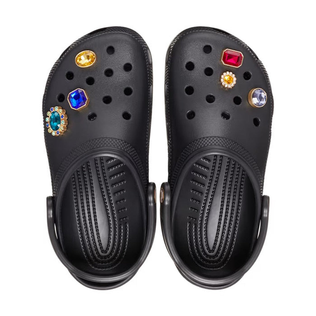 A pair of black Crocs - Classic Clog Jewel for women features Crocs Comfort, four removable colorful (yellow, red, blue, green) jewel embellishments, and a round flower-shaped charm on top., 196265870141, 196265870158, 196265870165, 196265870172, 19626587