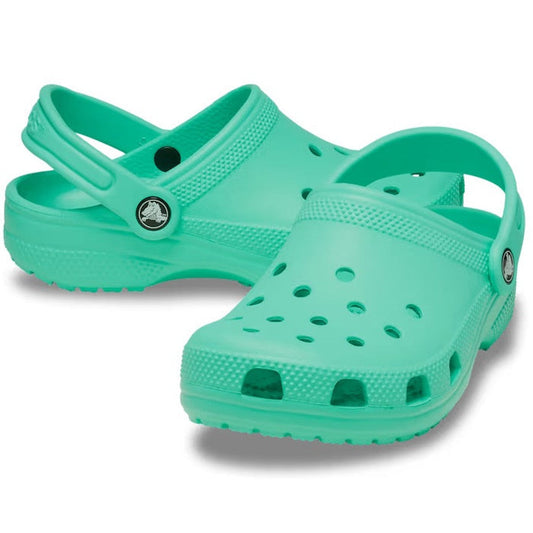 A pair of Crocs Kids Toddlers Classic Clog in Lagoon Green, toddler sizes, featuring perforated tops and adjustable heel straps, displayed on a white background.