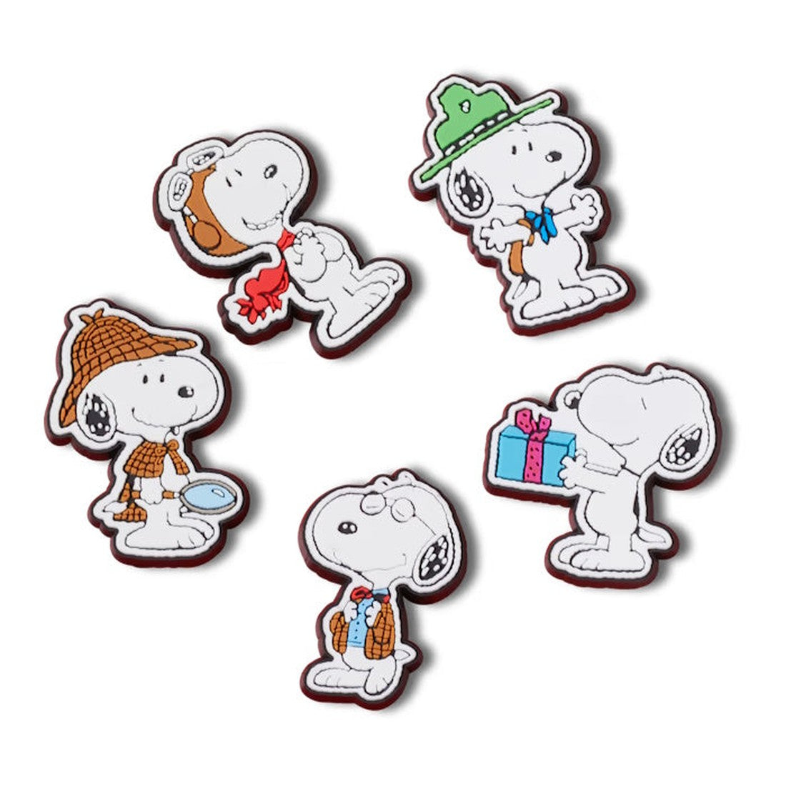 The Crocs Jibbitz 5 Pack - Peanuts Snoopy features five cartoon Snoopy charms: pilot, cowboy, detective, scholar, and one with a gift—perfect for fun Croc decorations., 196265356751